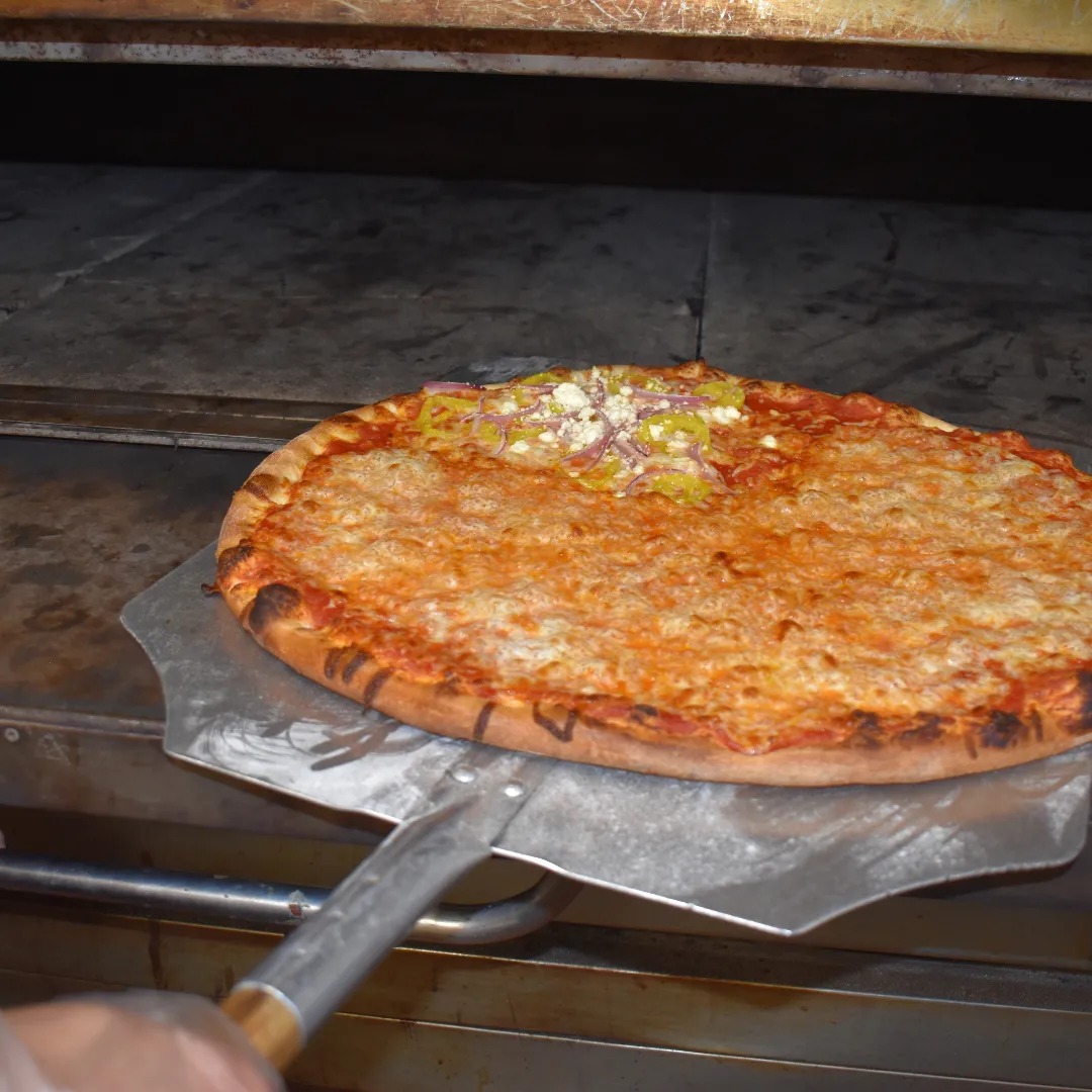 Delicious Blue Pizza topped with fresh ingredients