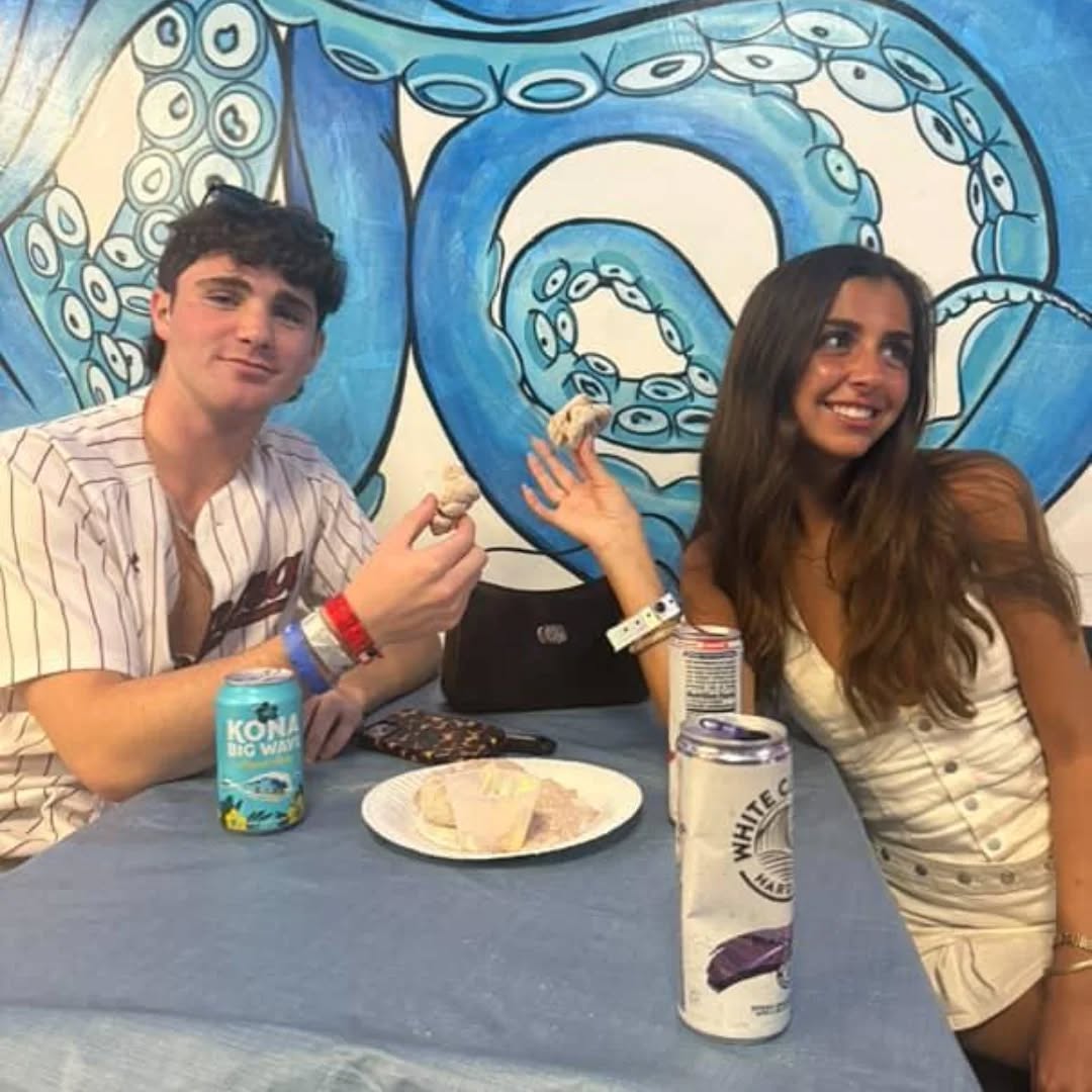 Happy Blue Pizza customer enjoying pizza